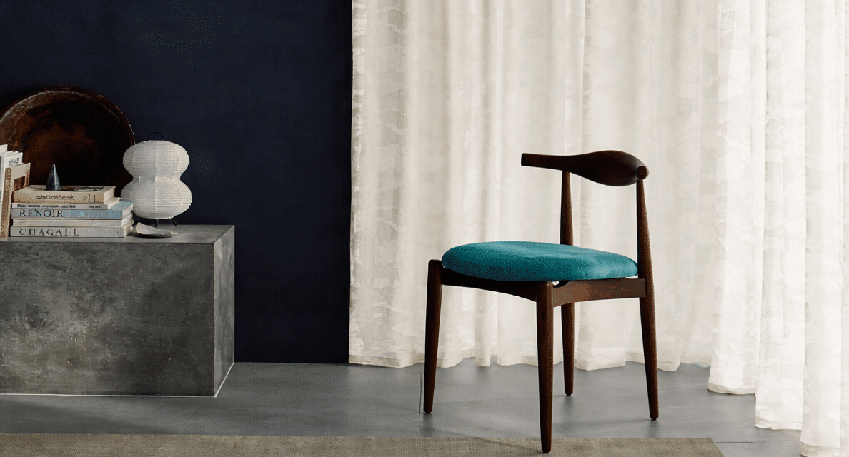 Minimalist living space with navy accents